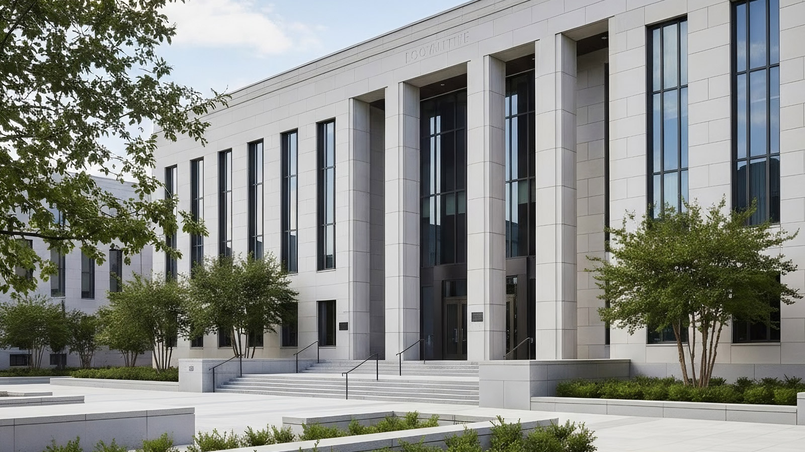 Exterior of a courthouse with classical columns